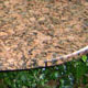 Circular table top in polished Balmoral granite Circular table top in polished Balmoral granite