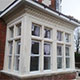 Stone window surrounds restored prior to painting Stone window surrounds restored prior to painting